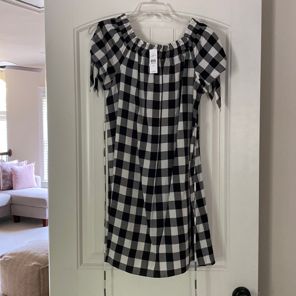 Loft black and white gingham dress with ruffle neckline and a tie waist.